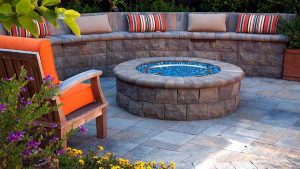 Paver stones outdoor fireplace step wall seating patio
