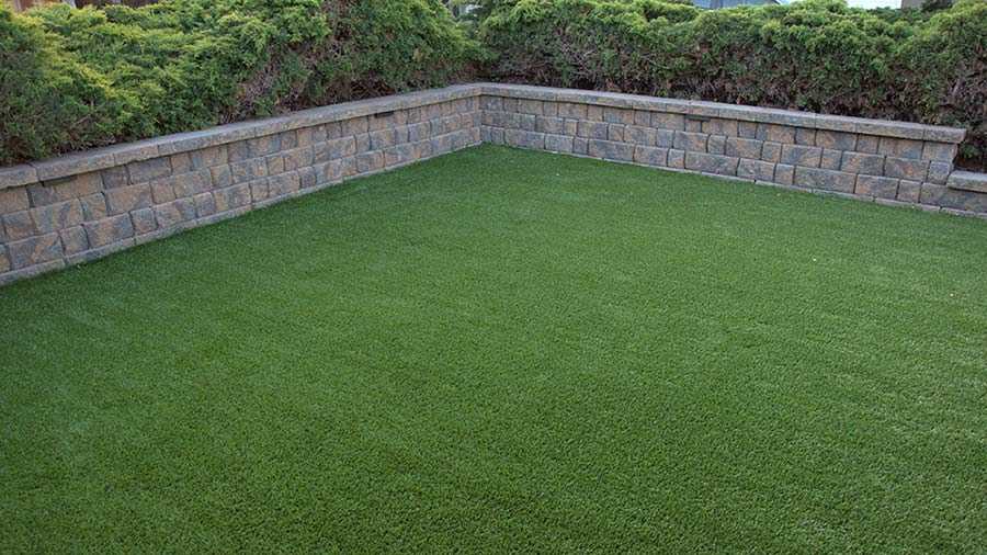 paver stone wall retaining wall synthetic lawn