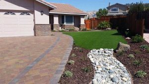 paver stone driveway and lawn