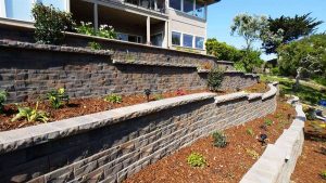 Retaining wall landscape plants paver stone wall