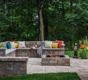 Paver stones outdoor fireplace step wall seating patio