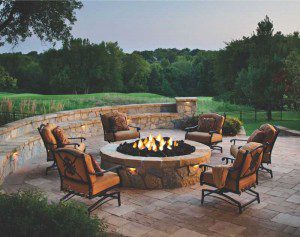 Paver stones outdoor fireplace step wall seating patio