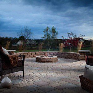 Paver stones outdoor fireplace step wall seating patio