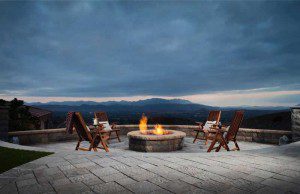 Paver stones outdoor fireplace step wall seating patio