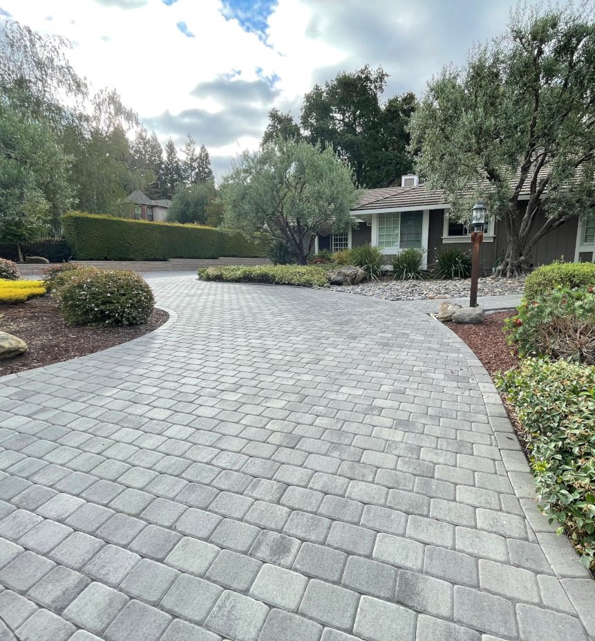 A beautiful paver stone driveway finished according to the digital design