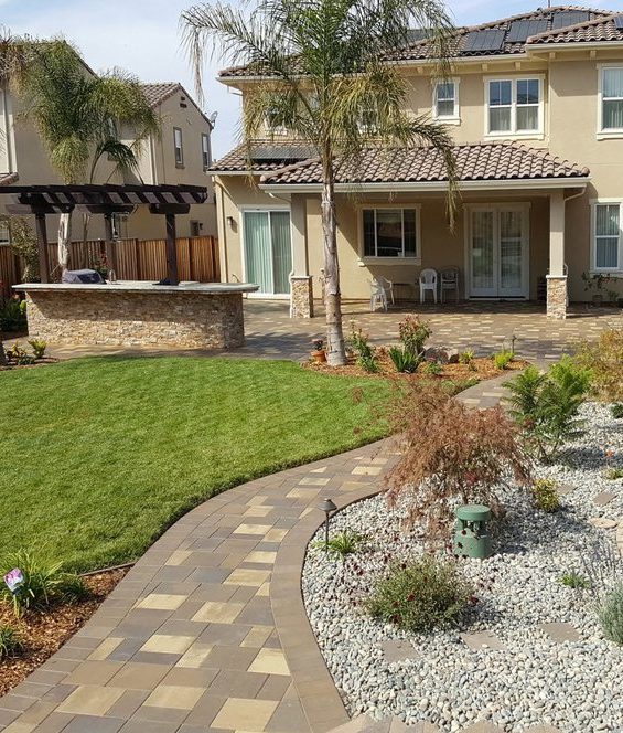 A beautiful paver stone patio on a warm sunny day